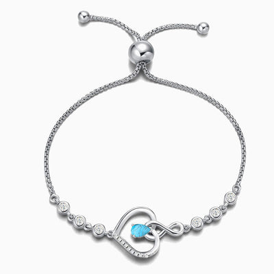 December Birthstone Inlaid Heart Wrapped Silver Bracelet