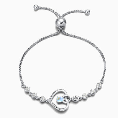 December Birthstone Inlaid Heart Wrapped Silver Bracelet