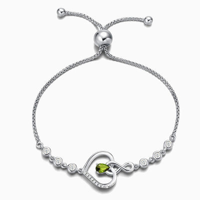 December Birthstone Inlaid Heart Wrapped Silver Bracelet